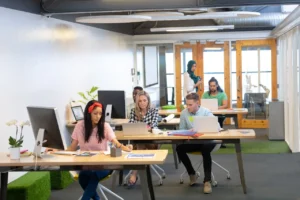 Modern open plan office in Dubai designed to enhance productivity and teamwork through collaborative workspaces.